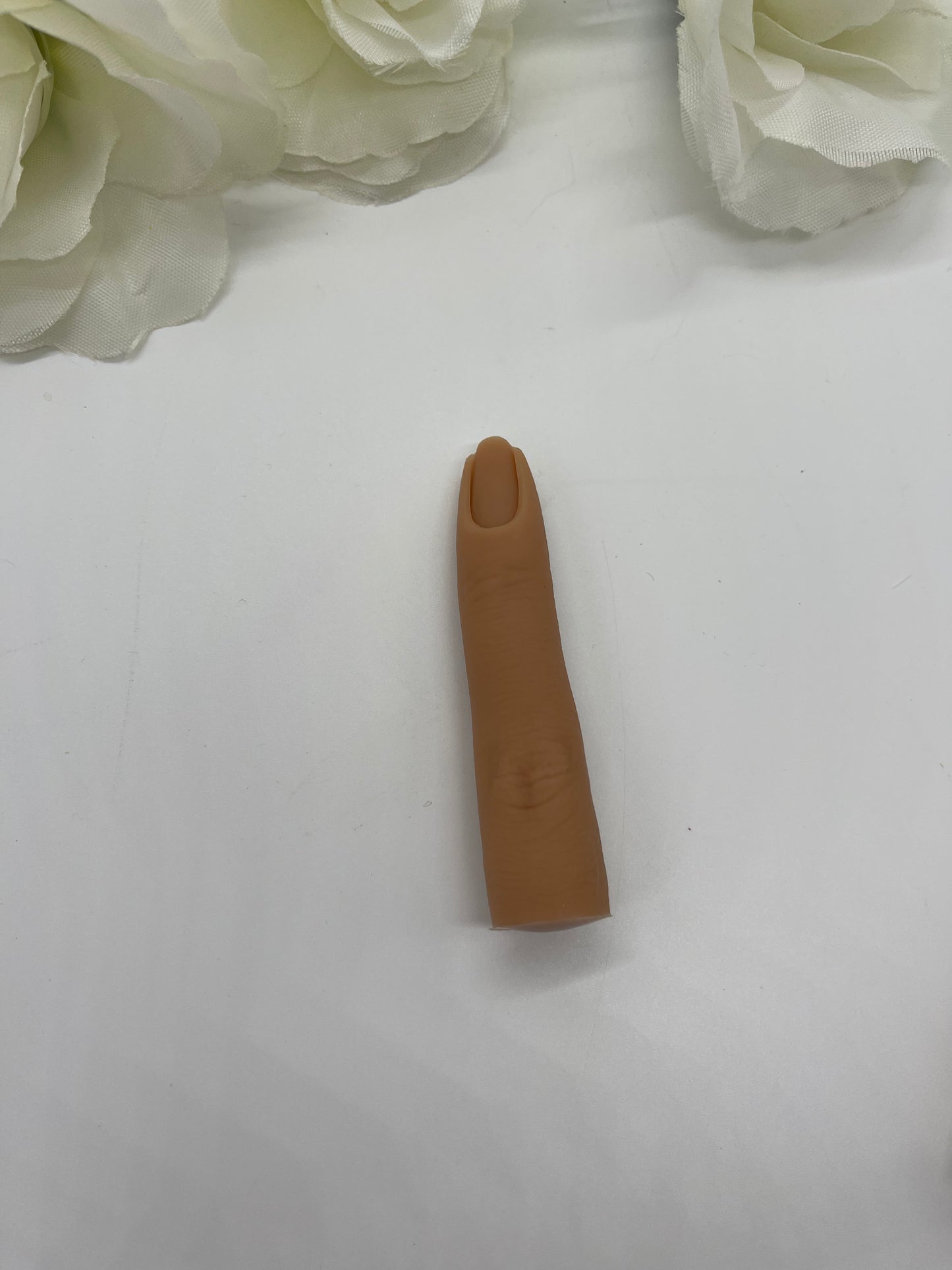 Realistic practice finger