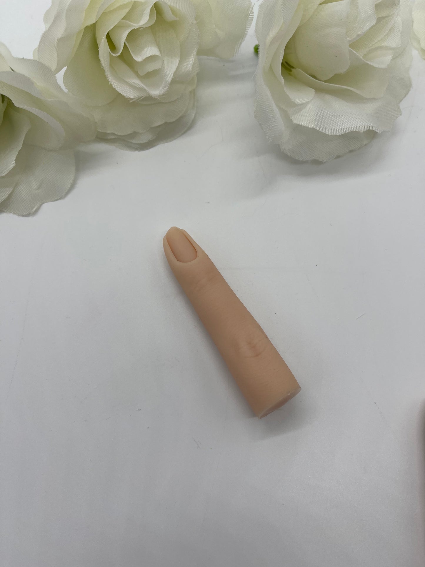 Realistic practice finger