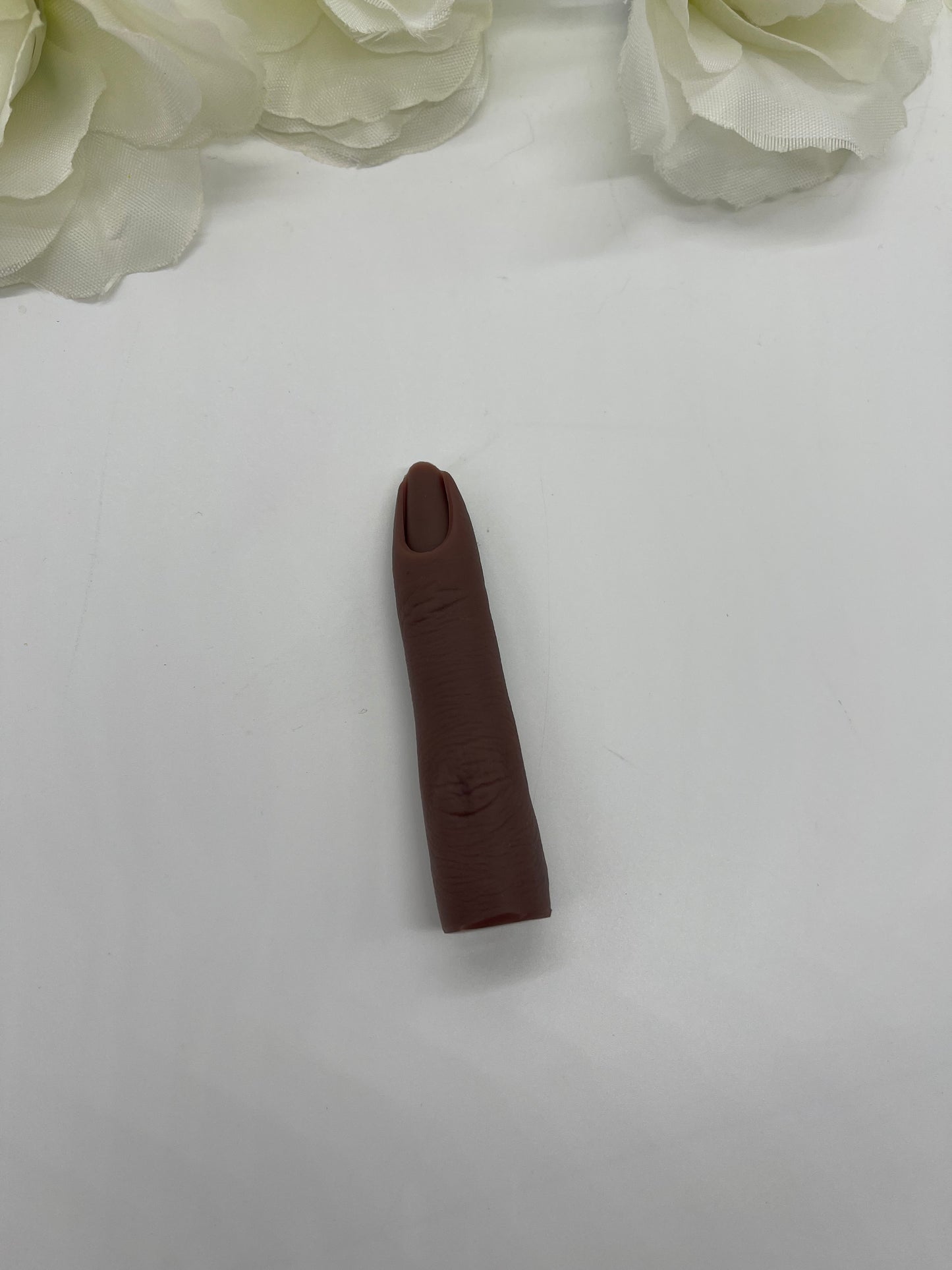 Realistic practice finger